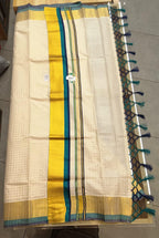 Kerala Set Saree - Flat lay showing gold, teal and navy border with tassel detail