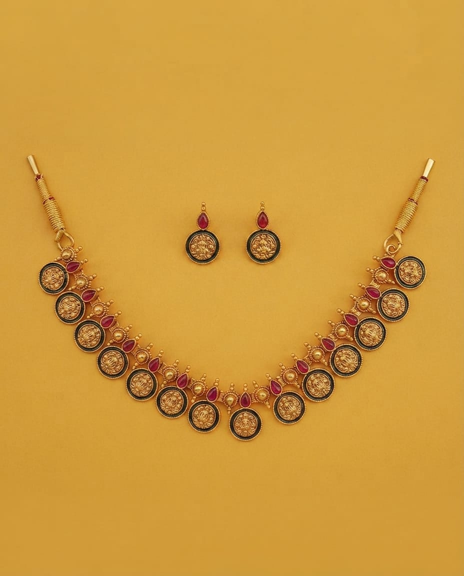 Temple coin necklace and earring set on yellow background